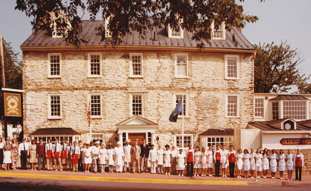 Red Fox staff in front of building in 1979