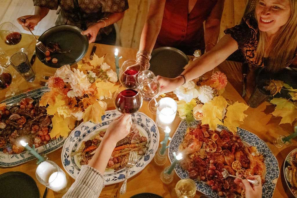 Friends enjoying a festive dinner at The Red Fox Inn & Tavern.