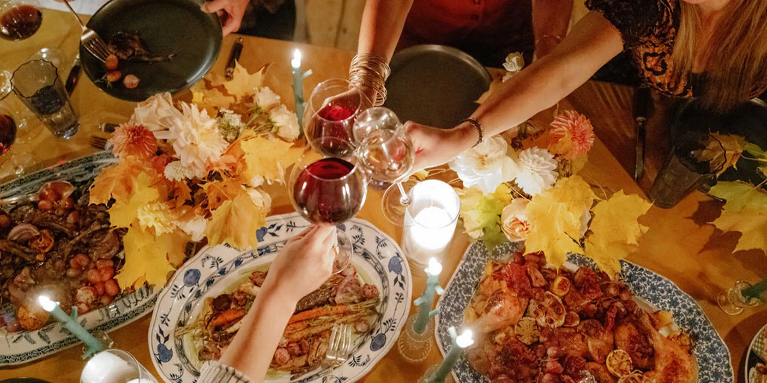 Elegant dinner at The Red Fox Inn & Tavern with wine glasses and autumn-themed table setting.