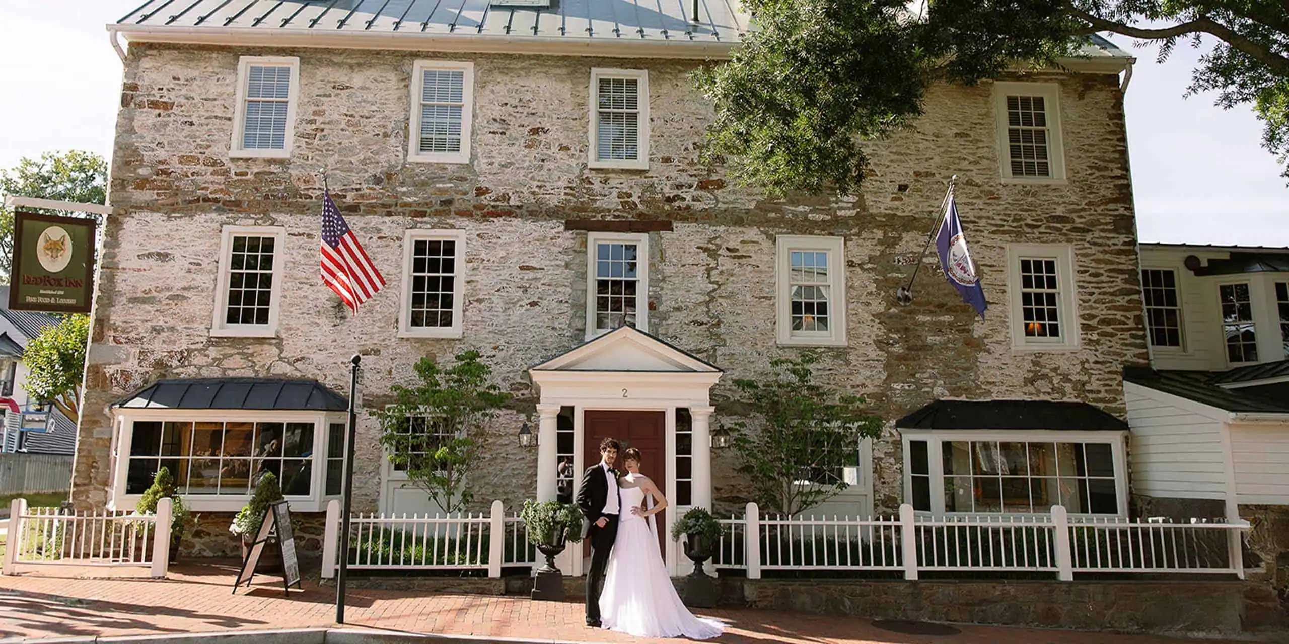 Charming stone building of The Red Fox Inn & Tavern in Middleburg, VA, showcasing historic architect.