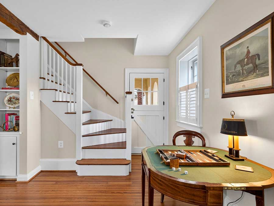 Cozy interior of Cedar Cottage with wooden floors and classic decor.