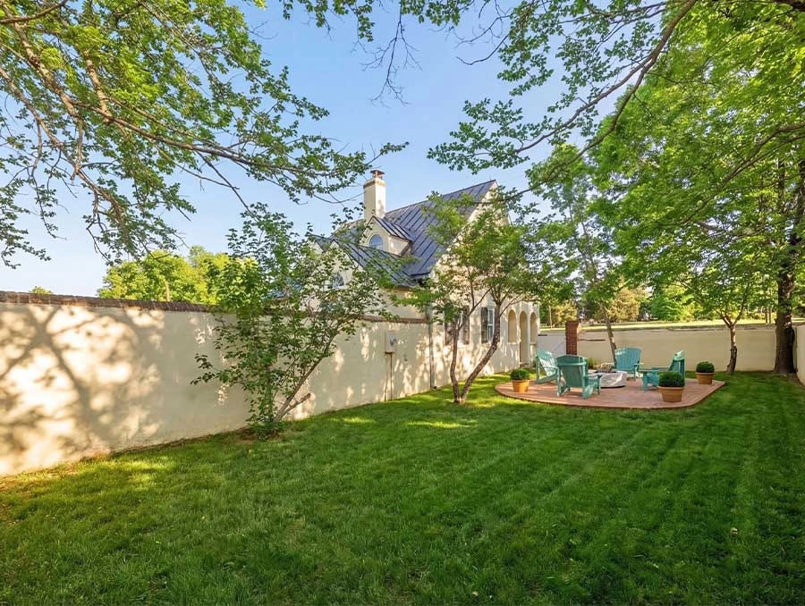 Beautiful backyard with Huntland Huntboxes and lush greenery.