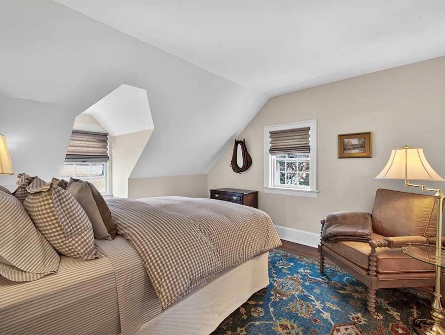 Cozy bedroom with classic decor and comfortable furnishings.