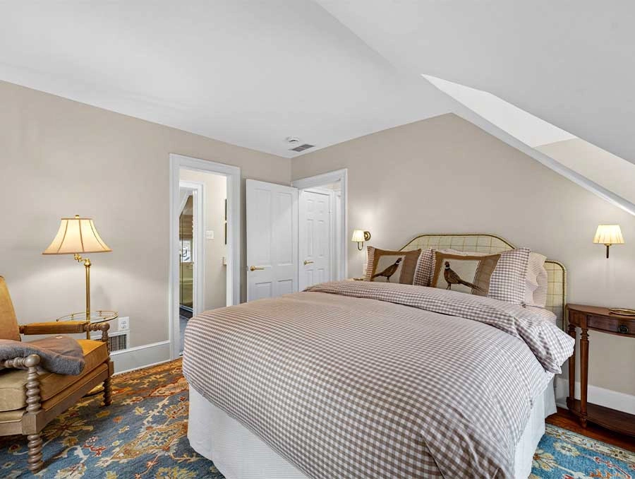 Cozy Inn Bedroom at The Red Fox Inn & Tavern Comfortable bedroom with king bed, lamps, and classic decor at The Red Fox Inn & Tavern.