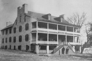 Historic black and white photo of The Red Fox Inn & Tavern building.